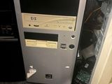 a computer that is sitting on the floor in the room