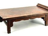 a small wooden bench with a wooden seat on it