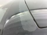 a close up of a car ' s windshield with a lot of water on it