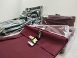 a pile of clothing that is sitting on a table