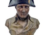 statue of a bust of a man with a hat on his head