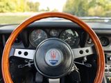 a steering wheel and dashboard of a sports car