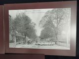 a picture of a picture of a horse and buggy on the street