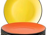 four plates stacked on top of each other on a white background