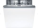 a white dishwasher with the door open on a white background