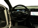the interior of a car with a steering wheel, dashboard, and dash board