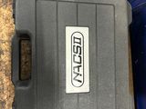 a plastic case with a sticker on it sitting on a table