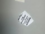 a sticker that is on the side of a toilet
