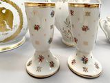 two cups sitting next to each other on a table