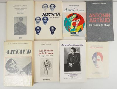 several books are stacked on top of each other on a table