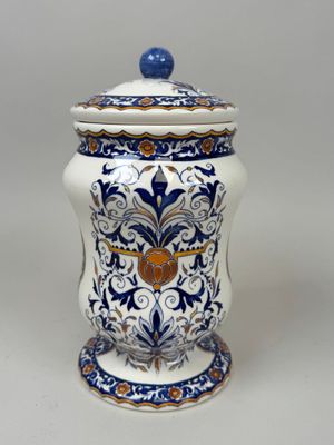 an image of a blue and white vase sitting on a table