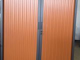 two doors that are open in a room