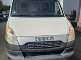 a white van that is parked in a parking lot