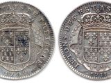 four different types of silver and gold coins on a white background