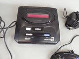 an image of a cd player and a mouse on a table