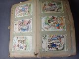 a open book with pictures of children and animals on it