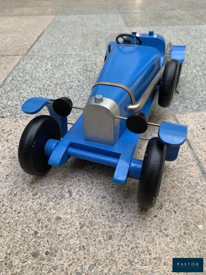 a toy car that is sitting on the ground