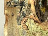 a painting of a woman sitting on a wall