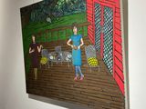 painting of a woman in a blue dress standing in front of a painting of a woman in a blue dress