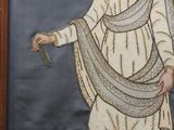 painting of a woman in a white dress holding a sword