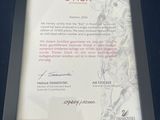photo encadrée d'un certificat « Stier » représentant un taureau, exposée dans une vitrine