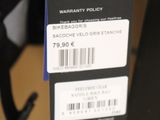 a label on the back of a bag that says warrant policy