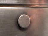 a close up of a metal object on a table