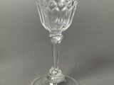 crystal wine goblet on grey background with white background