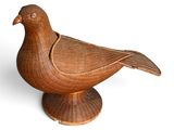 a bird that is sitting on top of a table