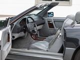 a car with the door open and the driver ' s seat down
