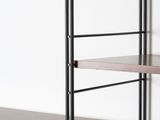 a close up of a bookshelf with two shelves on each side