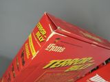two boxes of fruit sitting on top of each other