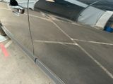 a car that is parked on the side of the street