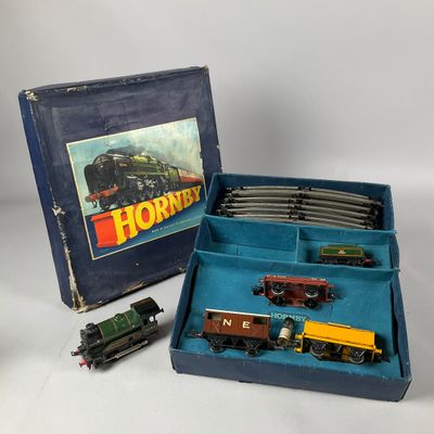 a box with a train set in it and a box with a train set in it