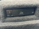 a close up of a car radio in the back of a vehicle
