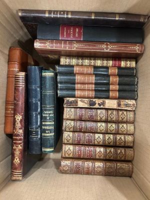 a box full of books that are sitting on a table