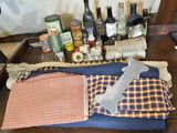 many bottles of alcohol and a knife on a table