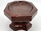 an image of a wooden bowl on a stand on a white surface