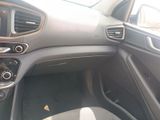 the interior of a car with a dashboard and steering controls
