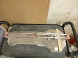 a small table with a tool on it in a room