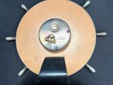 an image of a clock that is sitting on a table