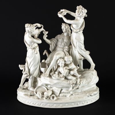 an image of a statue of a group of people sitting on a table