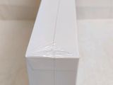a white box that is sitting on the floor