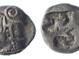 une pièce de monnaie ancienne sur laquelle figure l'effigie d'une femme