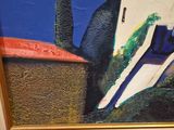 a picture of a painting on the wall of a house