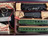 a box with a train set in it on a table