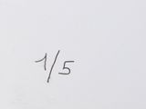 a close up of a white plate with a number on it