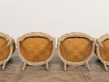 set of four chairs in the style of a chair in the style of a chair