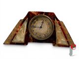 a clock that is sitting on top of a table