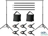 a set of photography backdrops with tripod stands and carrying bags